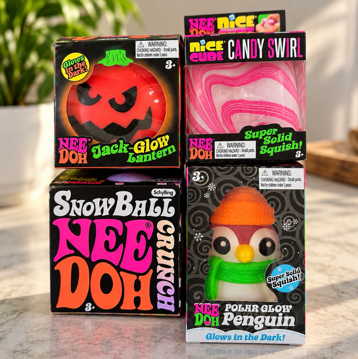 Rare NeeDoh 4-Piece Collector Bundle: Polar Glow, Candy Swirl, Jack-Glow & Snowball Crunch