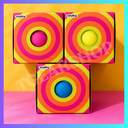 Three individually boxed Schylling NeeDoh Color Change toys in pink, yellow and blue.